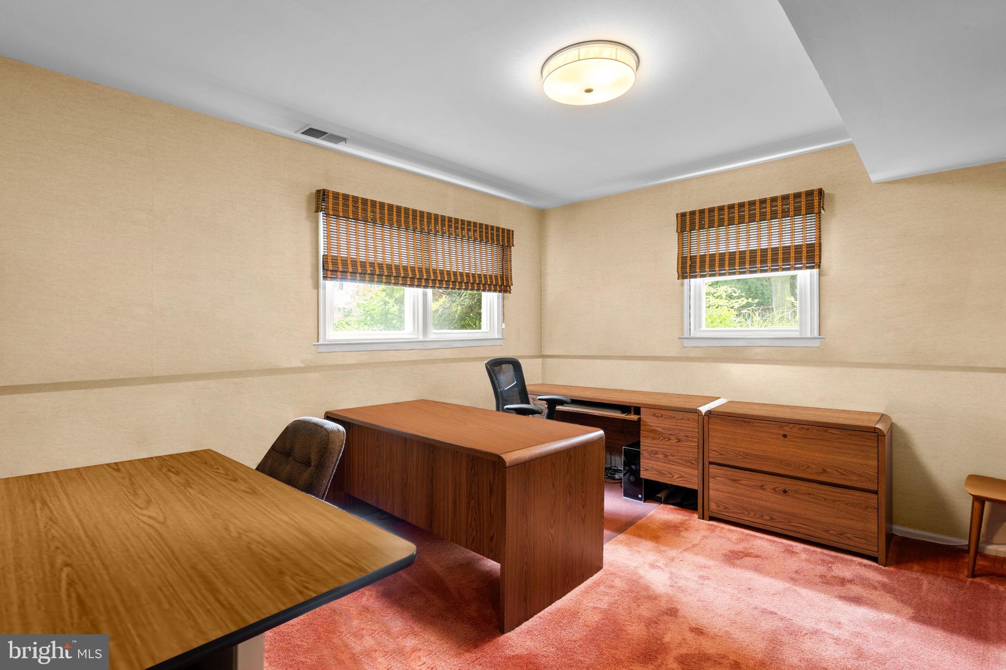 1709 Glastonberry Road Rockville, MD 20854 - Photo 15 of 27 a bed room with a bed and a window
