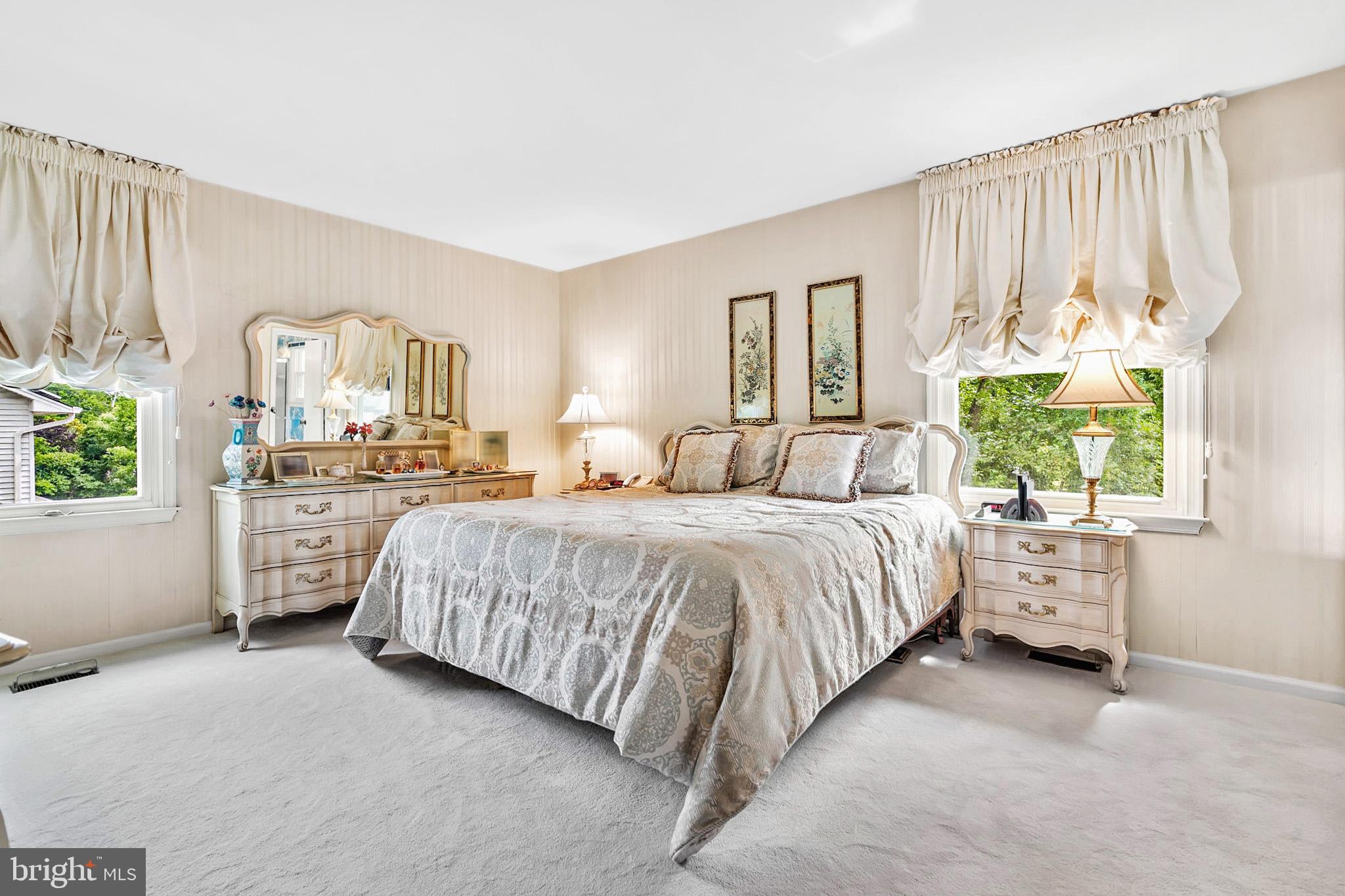 1709 Glastonberry Road Rockville, MD 20854 - Photo 18 of 27 a bed room with a bed and a window