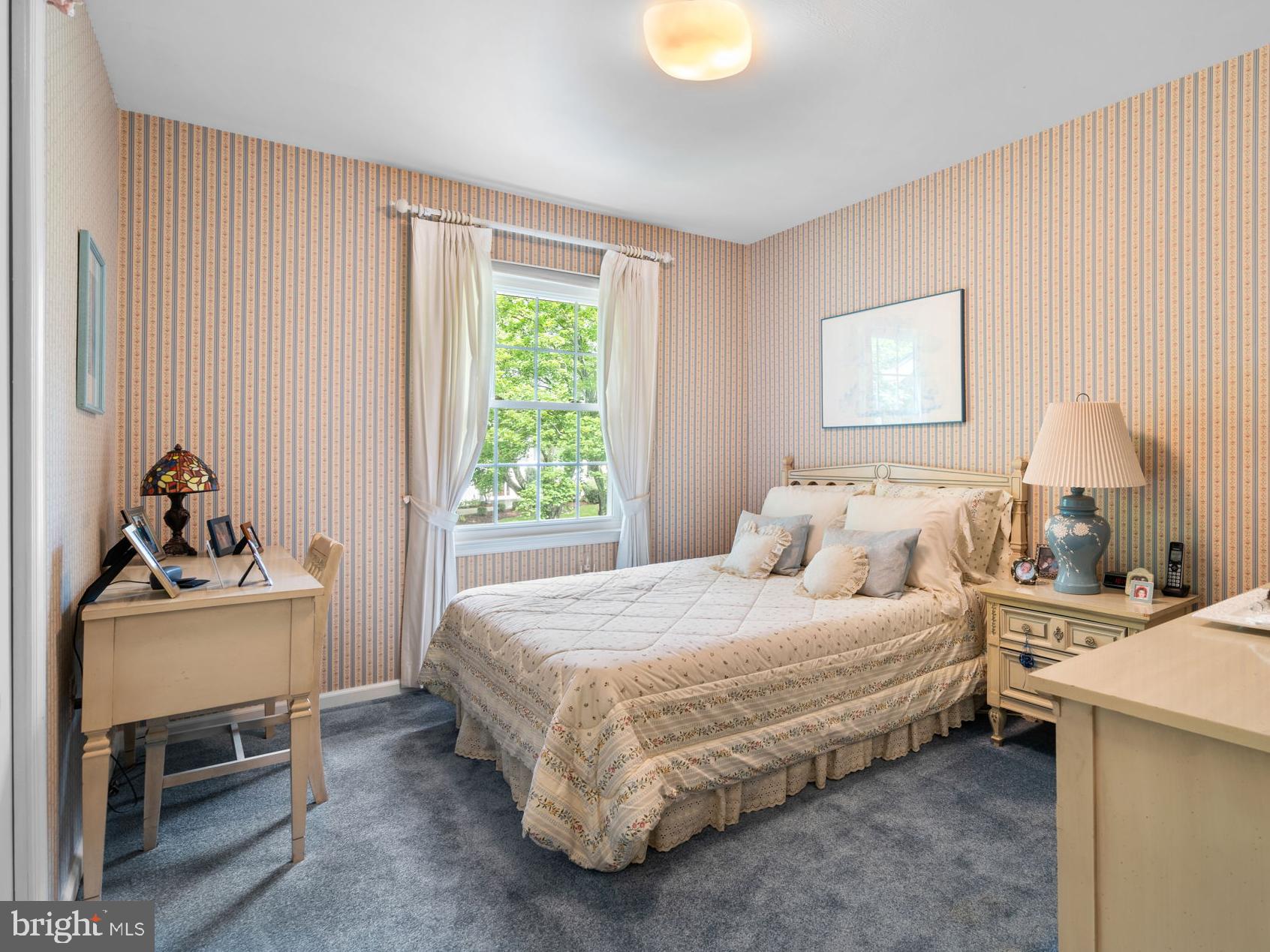 1709 Glastonberry Road Rockville, MD 20854 - Photo 20 of 27 a bedroom with a bed and a window