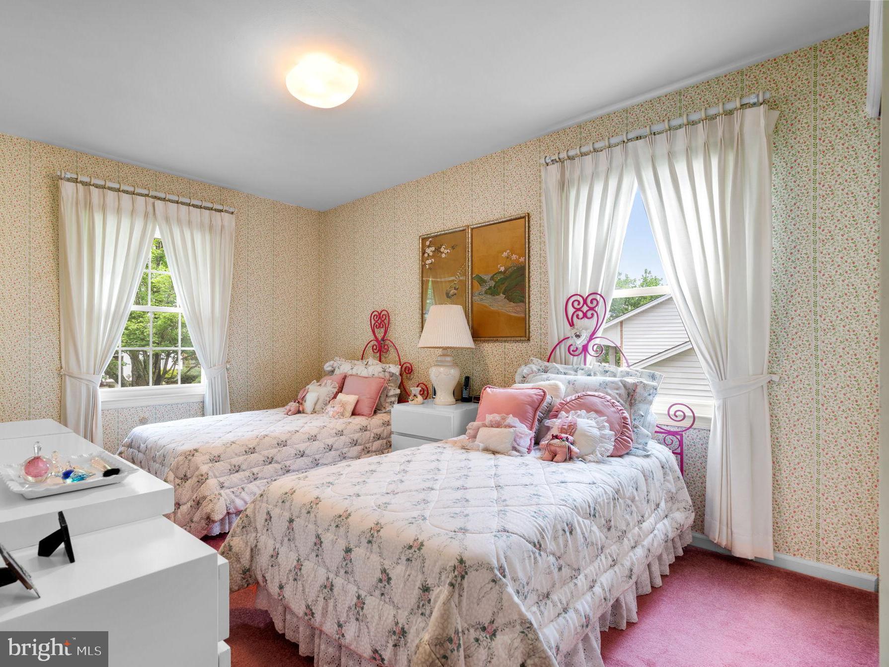 1709 Glastonberry Road Rockville, MD 20854 - Photo 23 of 27 a bedroom with a bed and a window