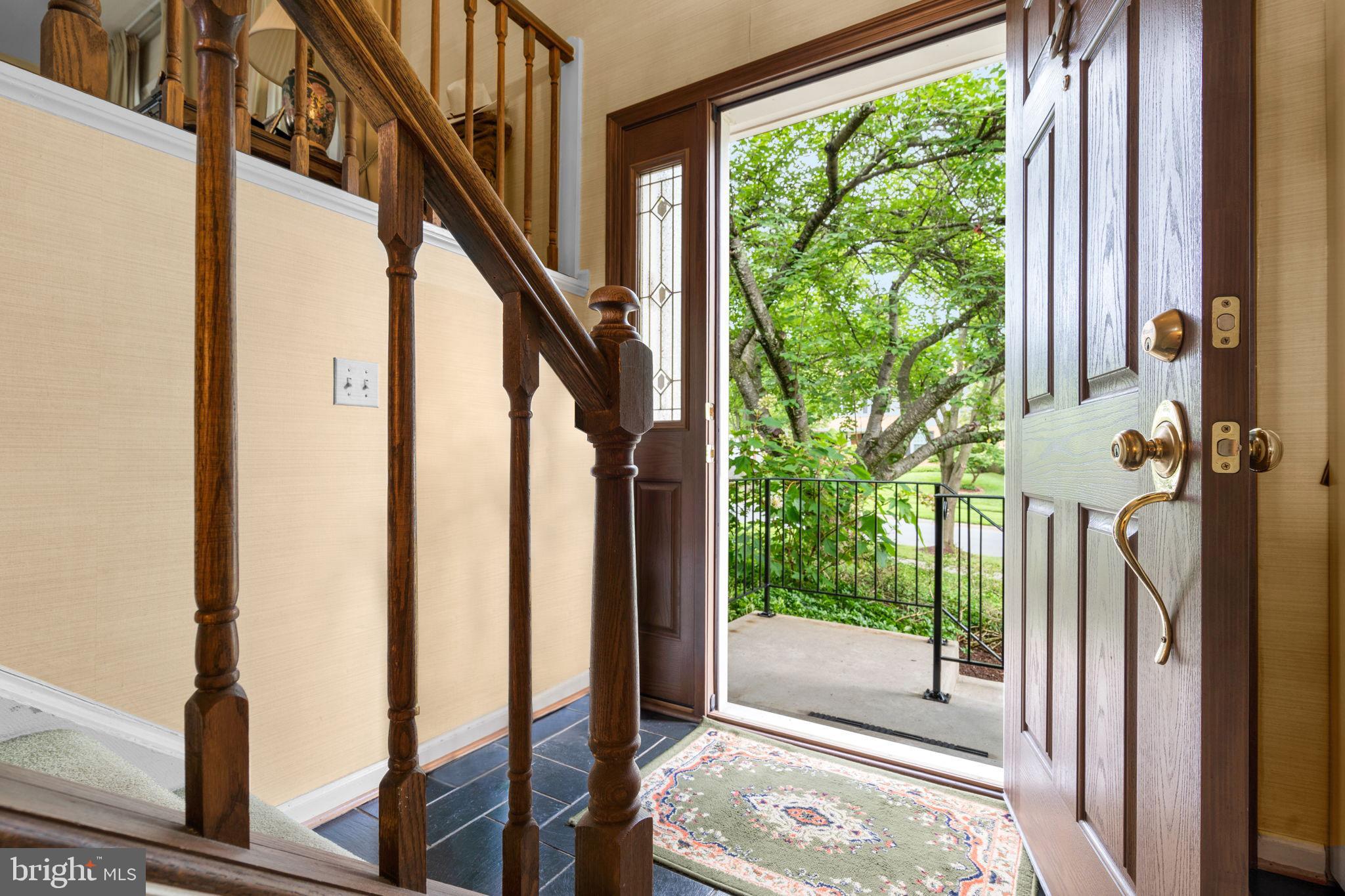 1709 Glastonberry Road Rockville, MD 20854 - Photo 3 of 27 a view of an entryway with garden