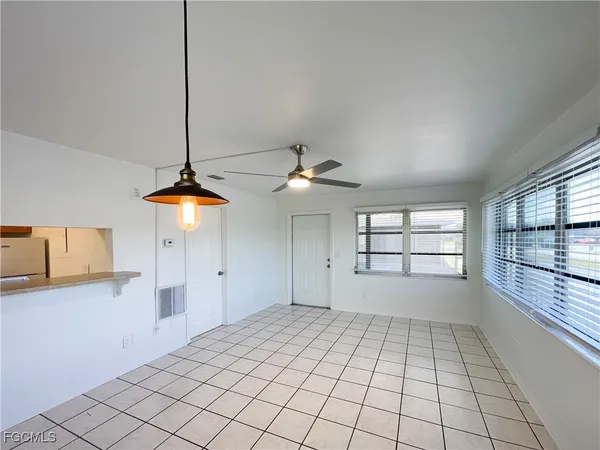 a view of an empty room and window