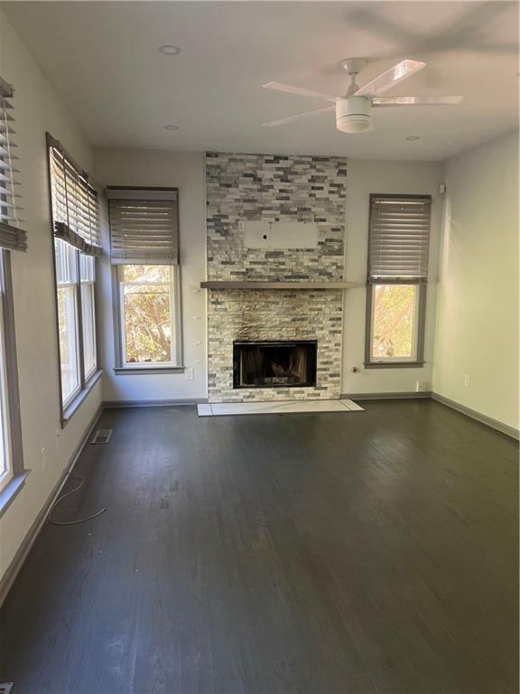 3335 Prairie Drive Snellville, GA 30039 - Photo 4 of 29 an empty room with windows and fireplace