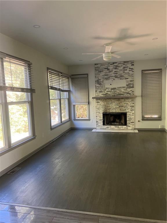 3335 Prairie Drive Snellville, GA 30039 - Photo 5 of 29 an empty room with windows and fireplace