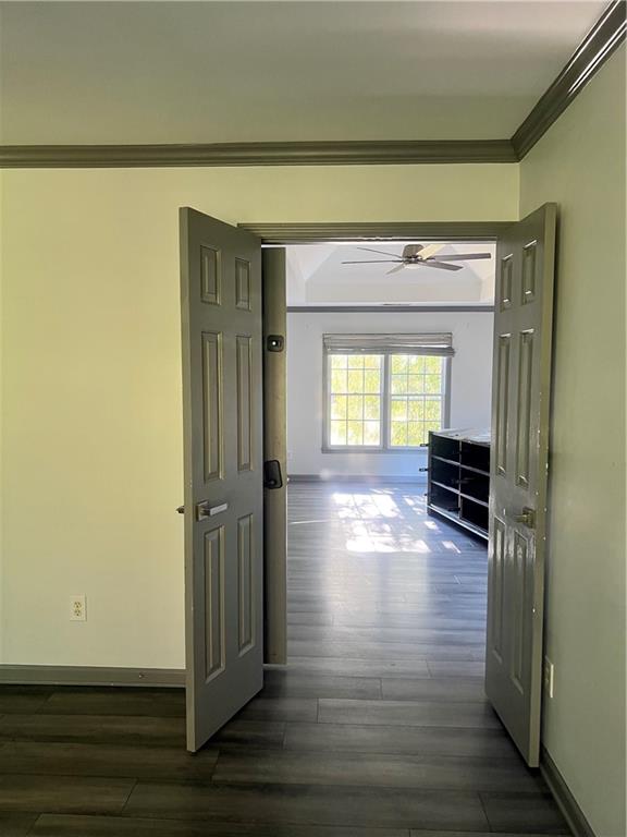 3335 Prairie Drive Snellville, GA 30039 - Photo 9 of 29 a view of empty room with wooden floor and fan