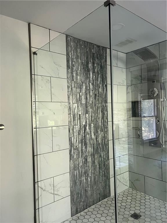 3335 Prairie Drive Snellville, GA 30039 - Photo 10 of 29 a bathroom with a shower