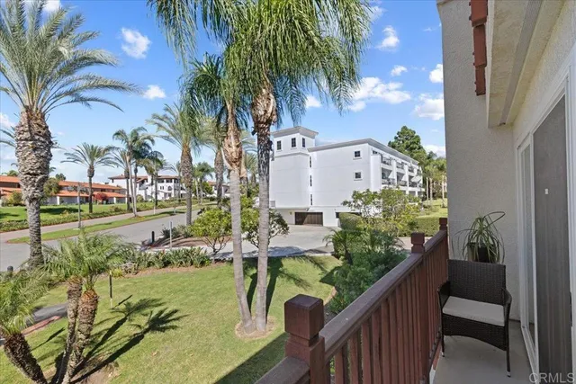 a view of balcony and yard