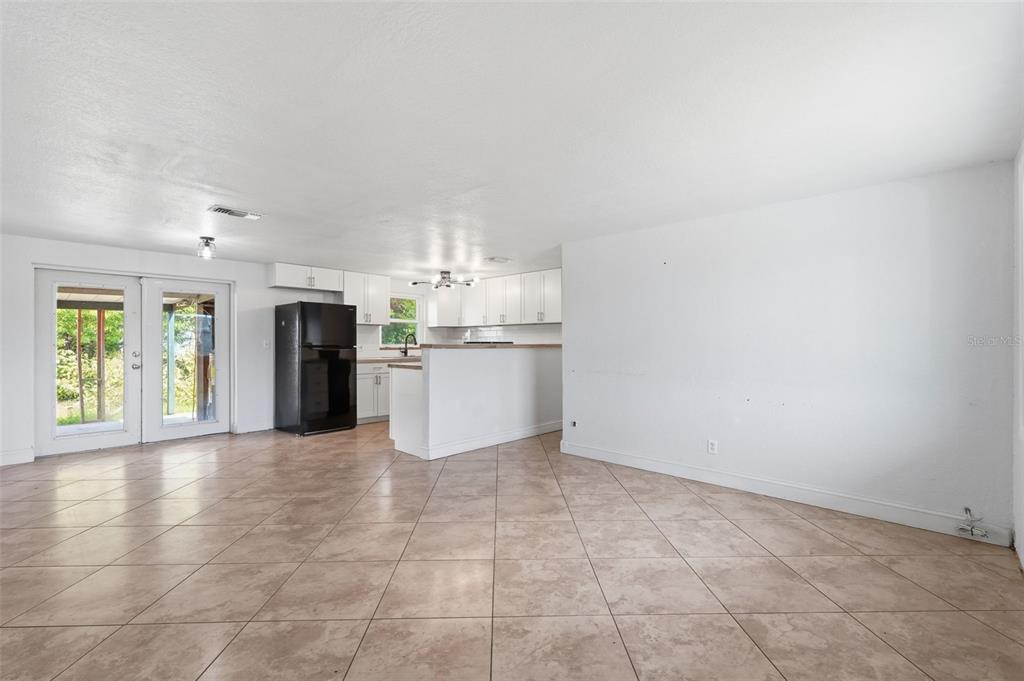 5421 64th Avenue North Pinellas Park, FL 33781 - Photo 12 of 43 a view of a kitchen with a sink and a stove top oven
