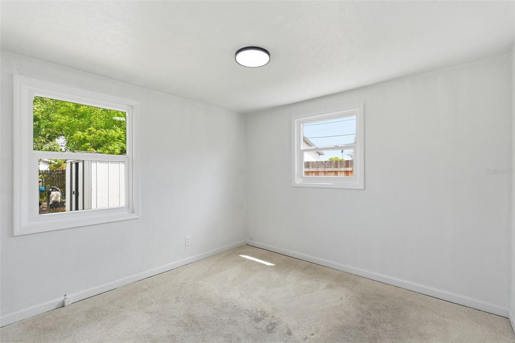 5421 64th Avenue North Pinellas Park, FL 33781 - Photo 22 of 43 an empty room with a window