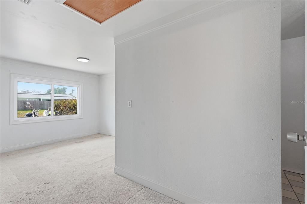 5421 64th Avenue North Pinellas Park, FL 33781 - Photo 25 of 43 a view of an empty room with a window
