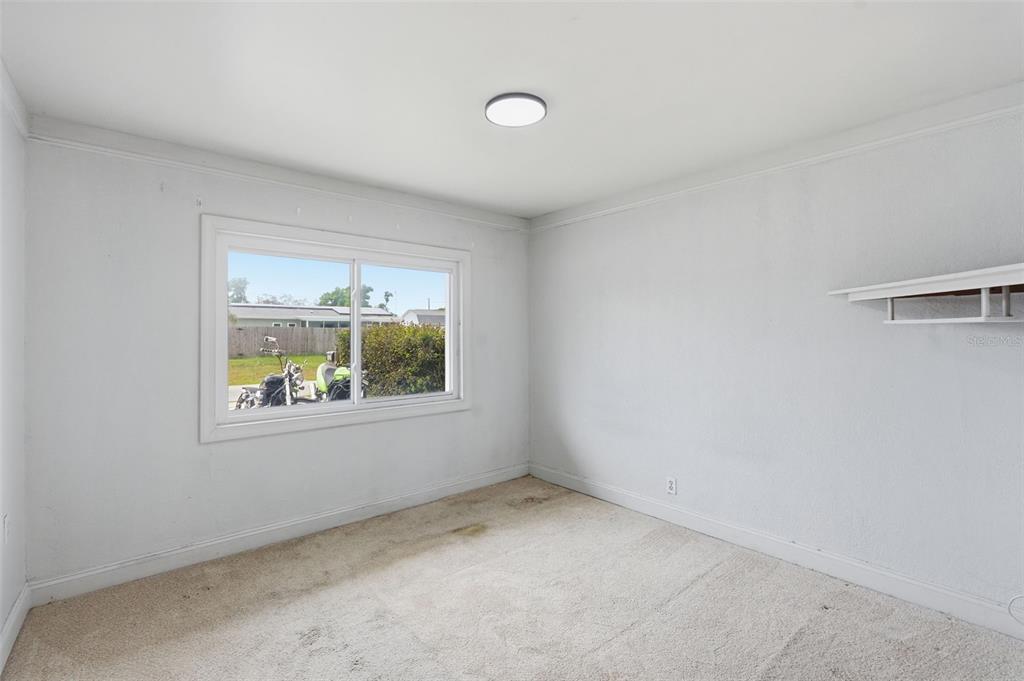 5421 64th Avenue North Pinellas Park, FL 33781 - Photo 27 of 43 an empty room with a window