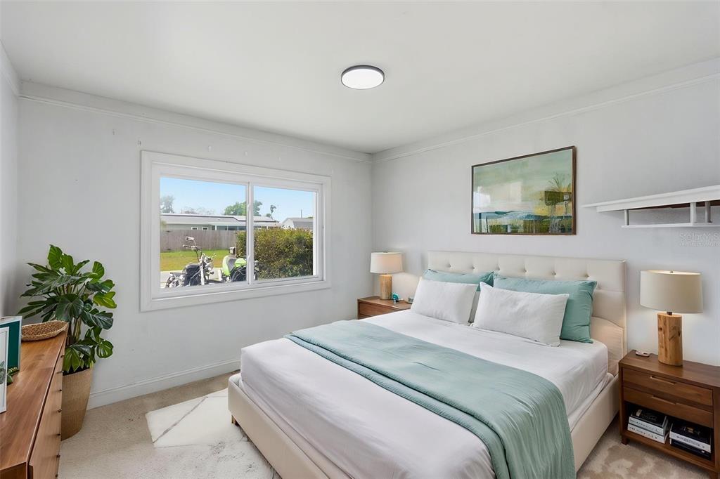 5421 64th Avenue North Pinellas Park, FL 33781 - Photo 28 of 43 a bedroom with a bed and a window