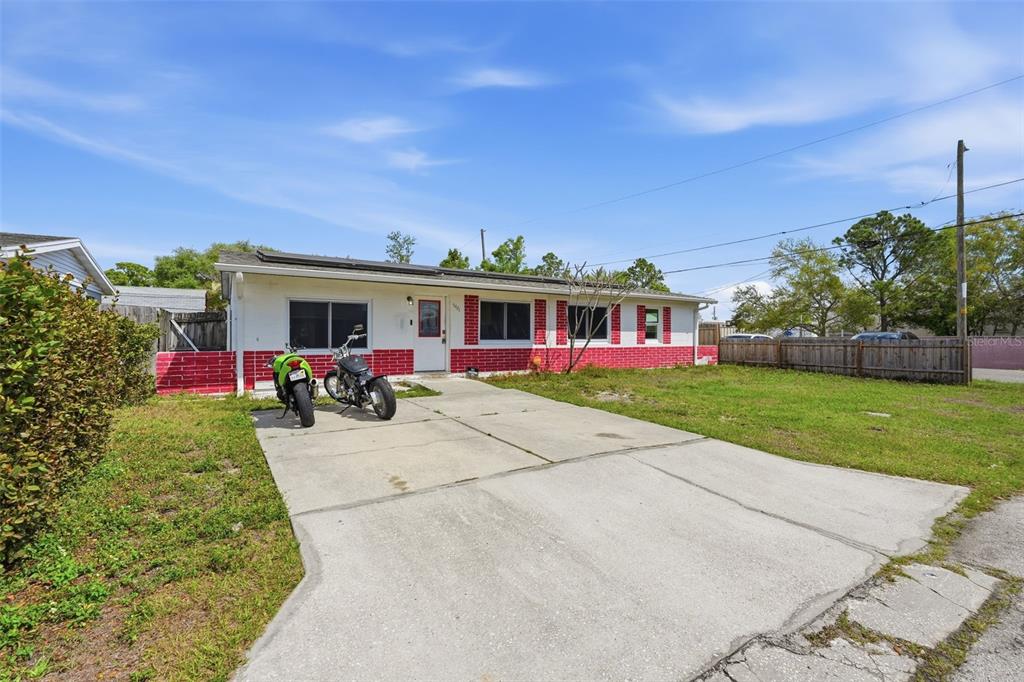 5421 64th Avenue North Pinellas Park, FL 33781 - Photo 39 of 43 front view of house with a yard