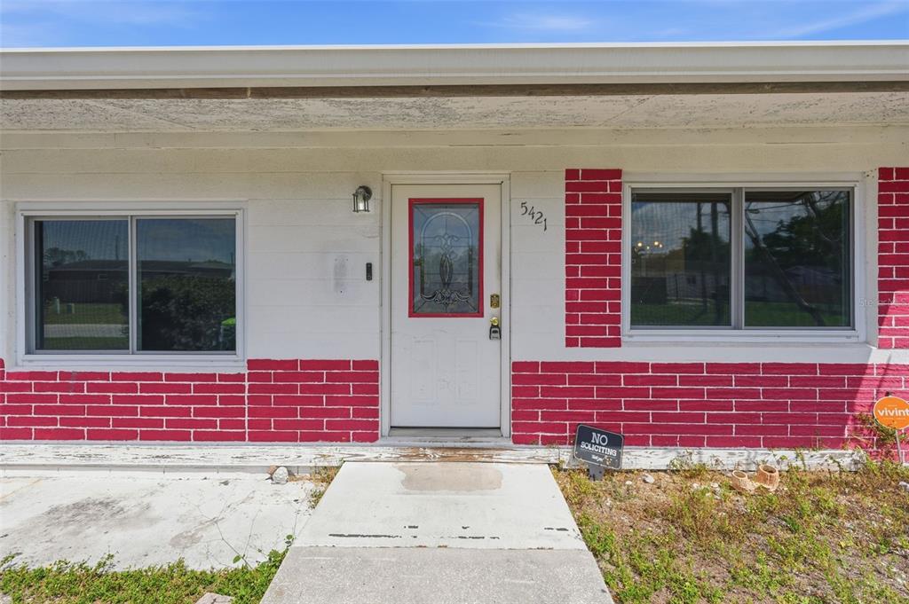 5421 64th Avenue North Pinellas Park, FL 33781 - Photo 41 of 43 a view of front door of a house