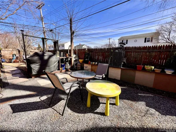 a view of a chairs and tables in patio