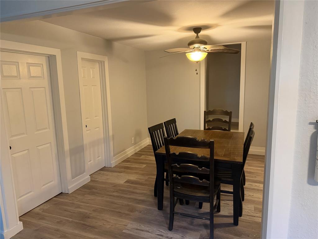 150 Ash Creek Court Springtown, TX 76082 - Photo 11 of 20 Dining area with light wood-style floors and ceiling fan