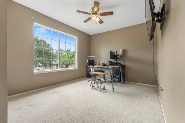 a workspace with furniture and a window