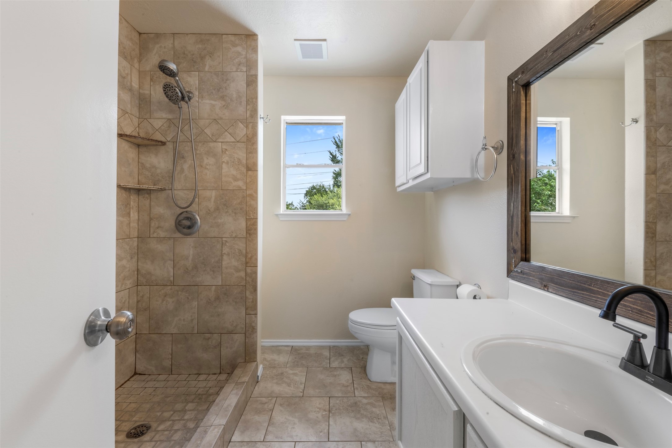3722 Oaklace Drive Spring, TX 77389 - Photo 24 of 37 a bathroom with a sink a toilet and shower