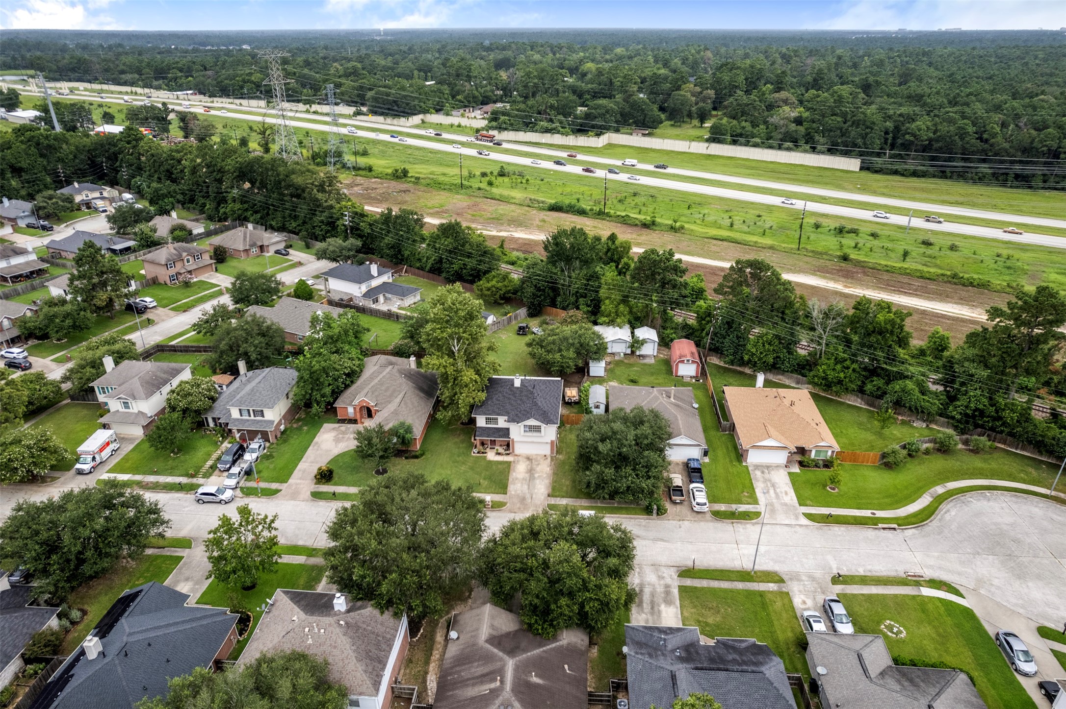 3722 Oaklace Drive Spring, TX 77389 - Photo 28 of 37 an aerial view of a houses with a yard and lake view