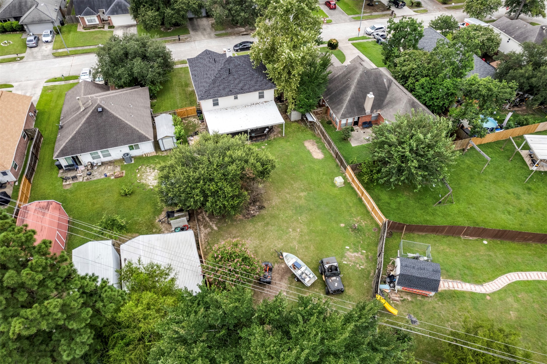 3722 Oaklace Drive Spring, TX 77389 - Photo 34 of 37 an aerial view of a house with swimming pool and outdoor seating