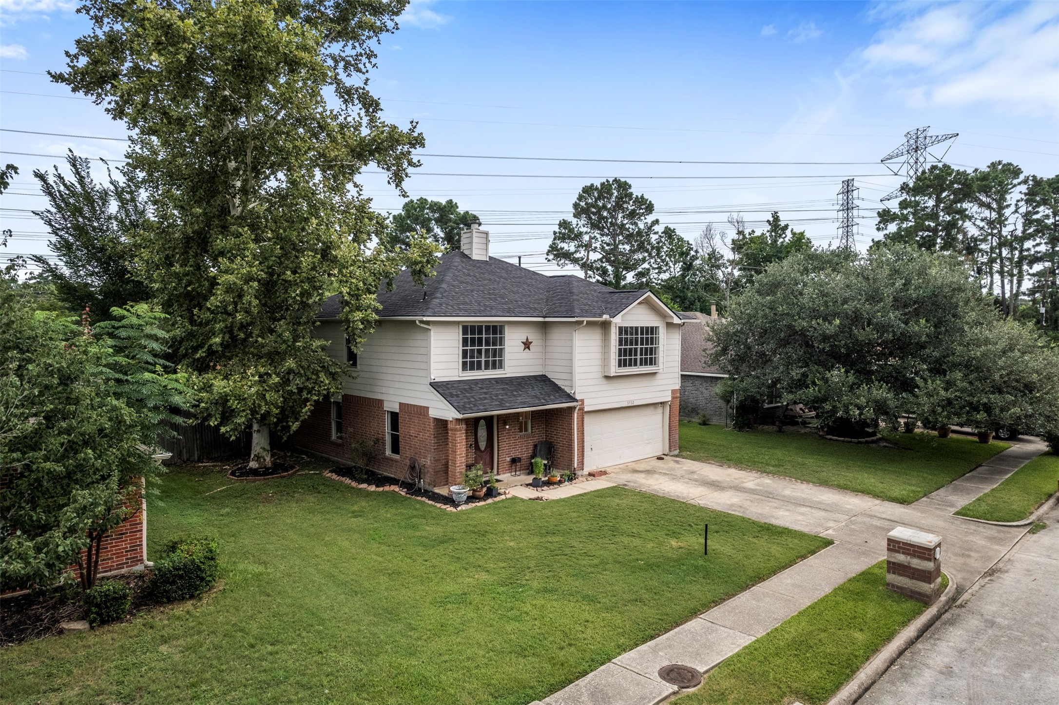 3722 Oaklace Drive Spring, TX 77389 - Photo 36 of 37 a view of a house with a yard and roof