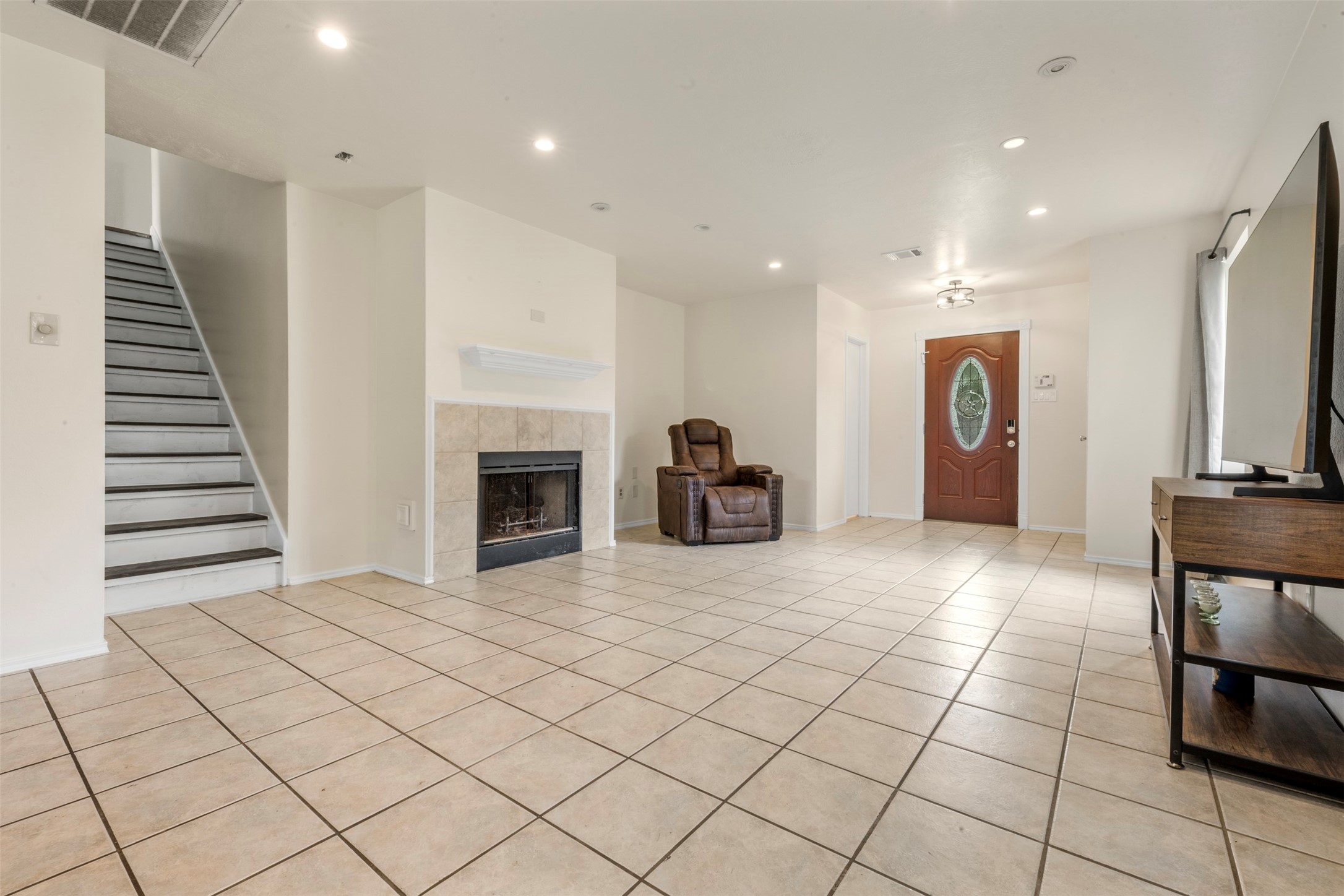 3722 Oaklace Drive Spring, TX 77389 - Photo 7 of 37 a view of a livingroom with furniture and a fireplace