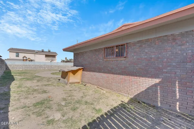 a view of swimming pool with seating area