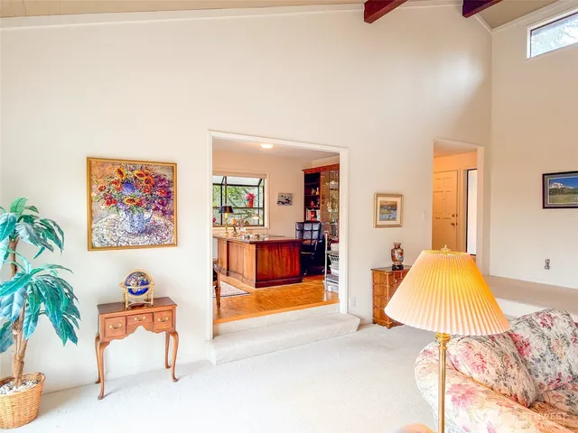 a view of living room with furniture and a couch