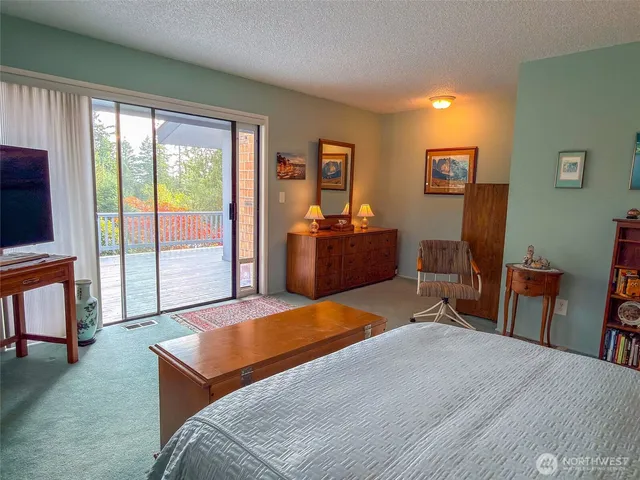 a bedroom with a bed and furniture