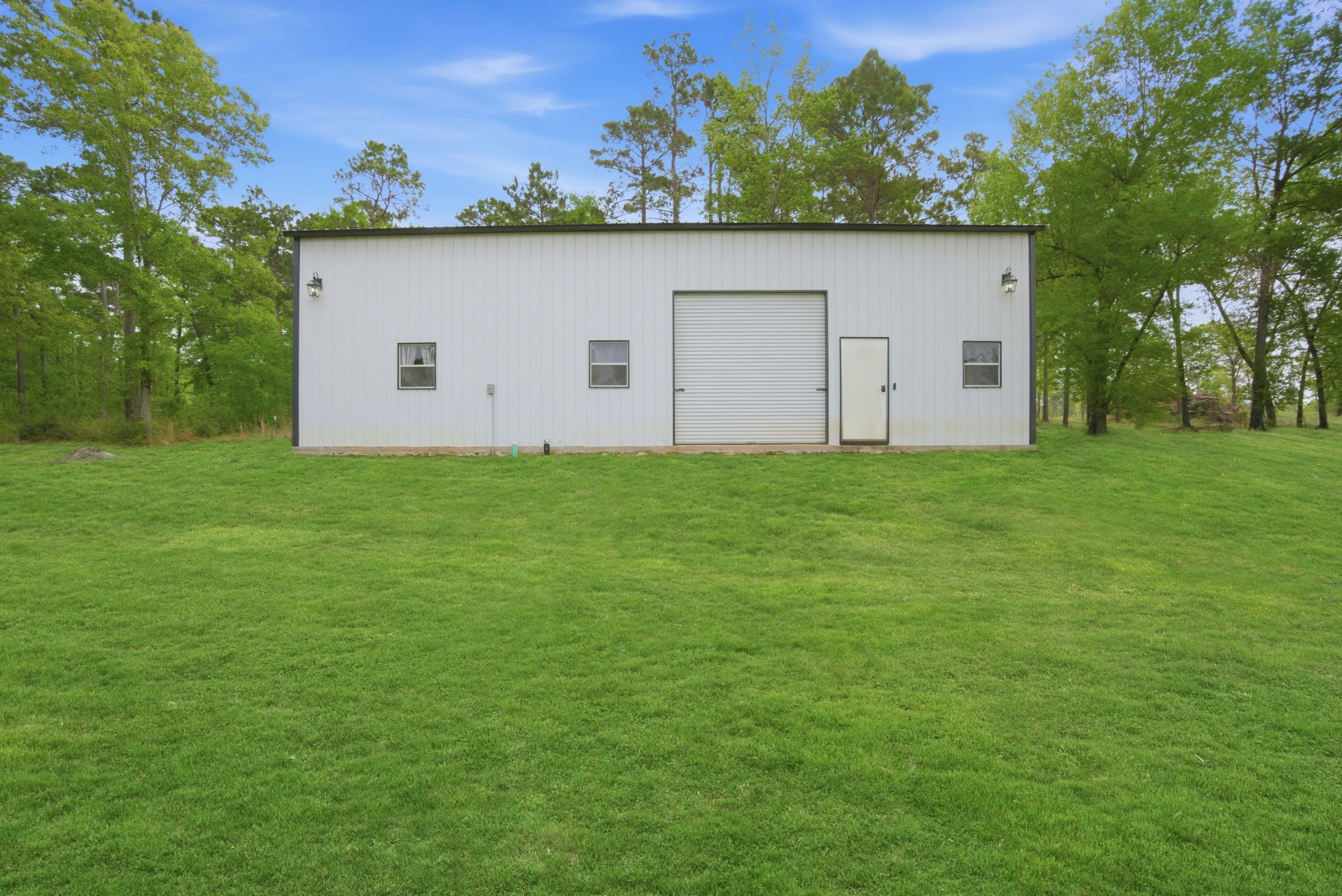 446 Hanson Road Onalaska, TX 77360 - Photo 2 of 27 metal shop with living area