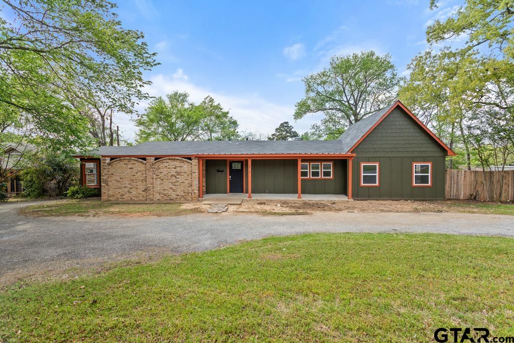 2819 New Copeland Road Tyler, TX 75701 - Photo 1 of 39 a front view of house with yard and trees