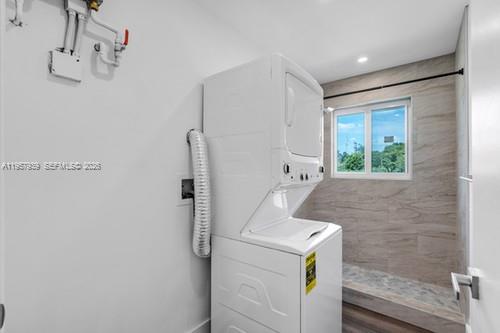 13770 Southwest 192nd Street Miami, FL 33177 - Photo 24 of 28 a utility room with dryer and washer