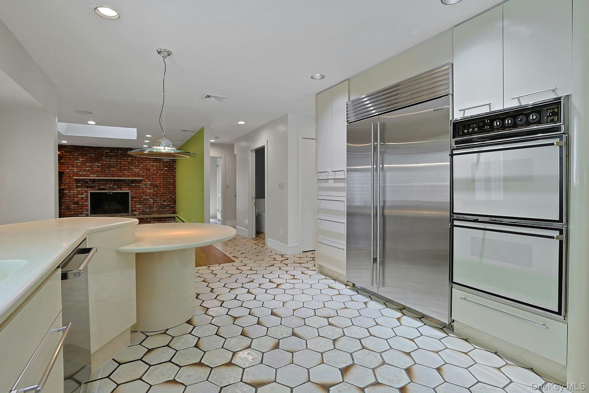44 Ruth Drive New City, NY 10956 - Photo 9 of 40 A view of the double ovens, Sub Zero built in refrigerator & beyond