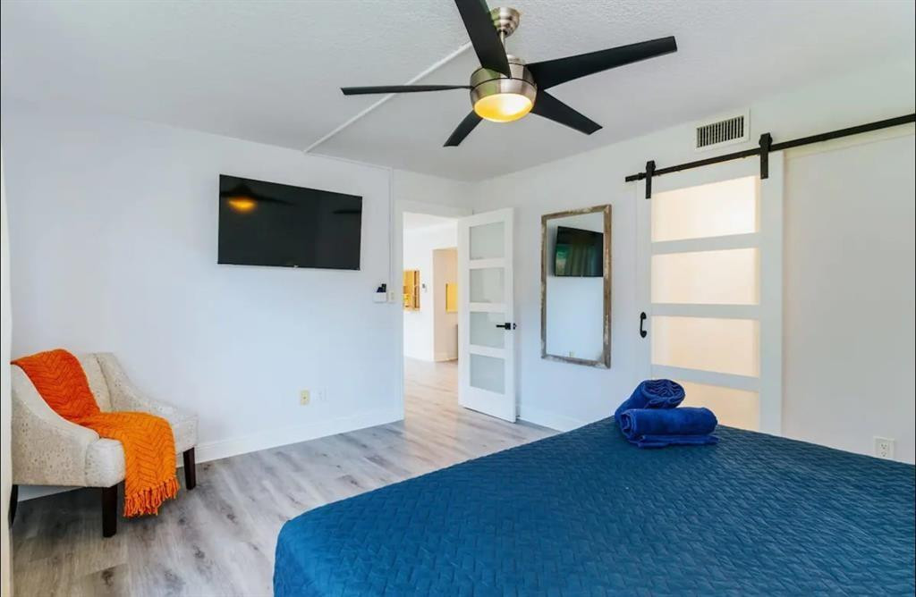2521 Northeast 51st Street Lighthouse Point, FL 33064 - Photo 13 of 24 a living room with furniture and a flat screen tv