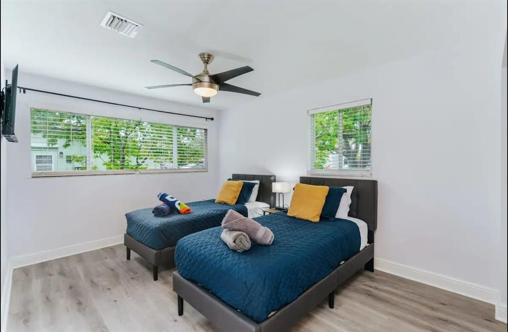 2521 Northeast 51st Street Lighthouse Point, FL 33064 - Photo 16 of 24 a living room with furniture and a window