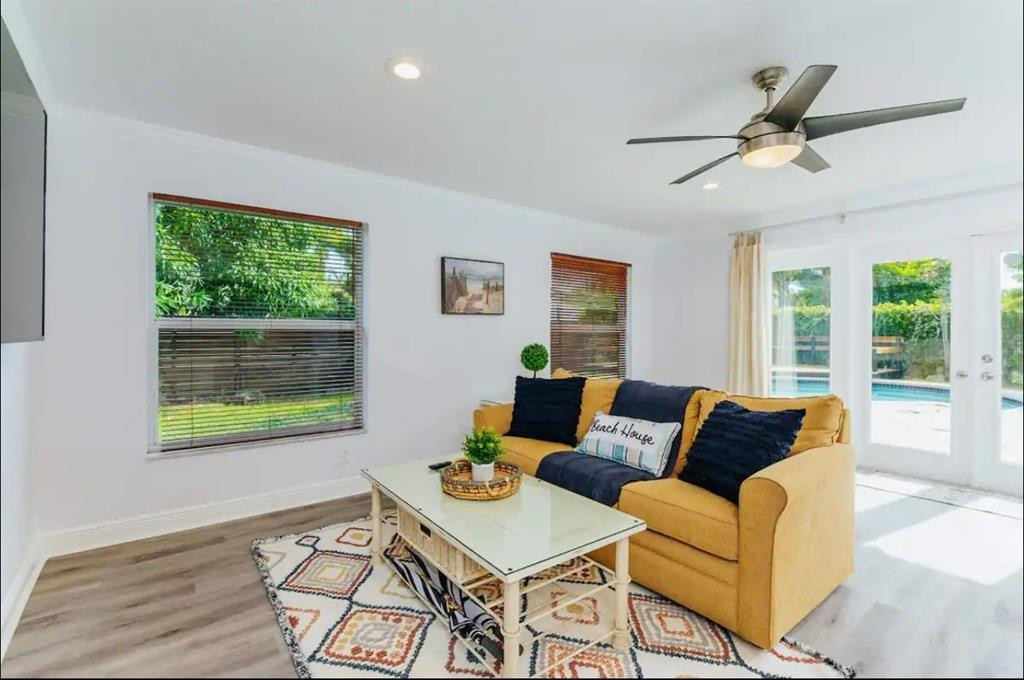 2521 Northeast 51st Street Lighthouse Point, FL 33064 - Photo 7 of 24 a living room with furniture and a window