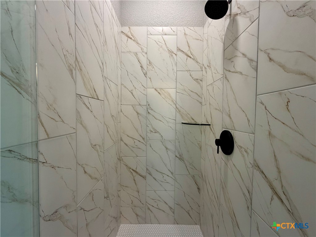6903 Wizard Drive Killeen, TX 76549 - Photo 15 of 23 a bathroom with a shower