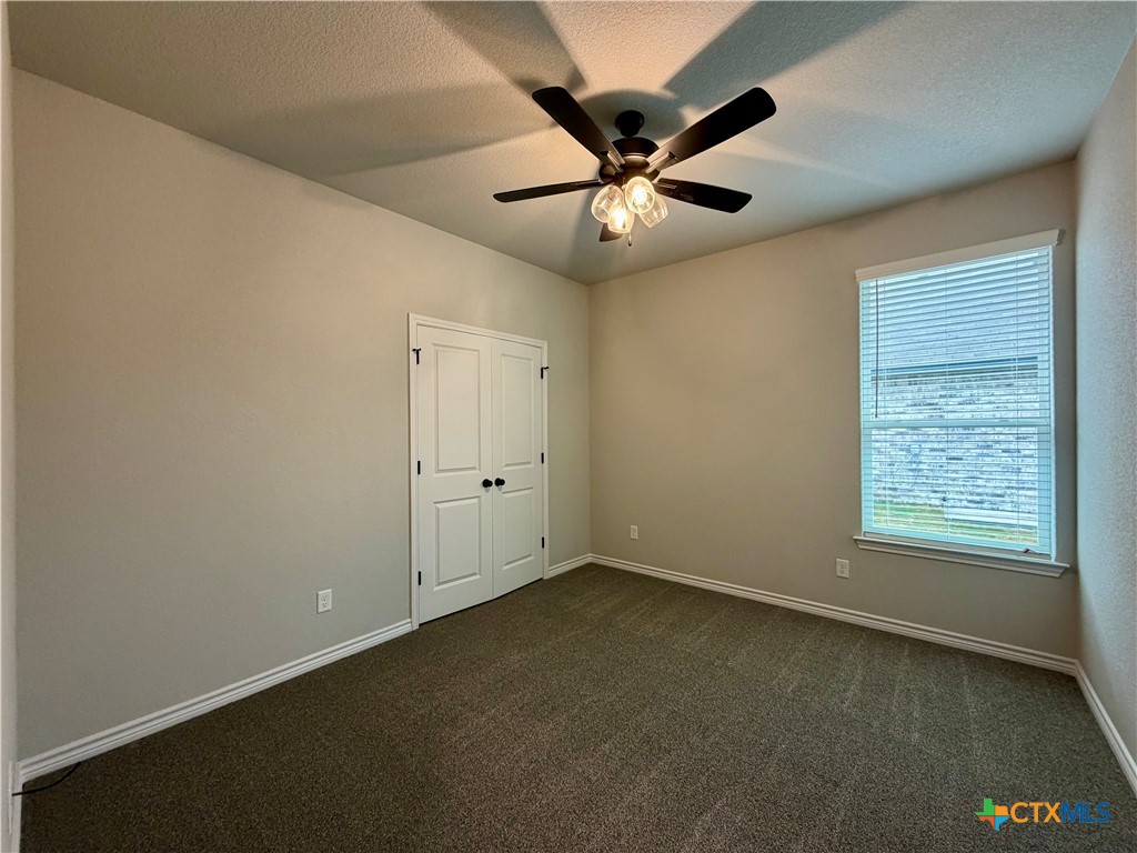 6903 Wizard Drive Killeen, TX 76549 - Photo 17 of 23 an empty room with a window and a fan
