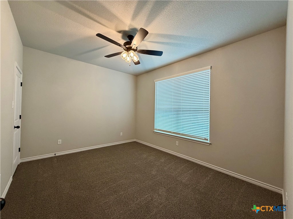 6903 Wizard Drive Killeen, TX 76549 - Photo 20 of 23 an empty room with a window and a fan
