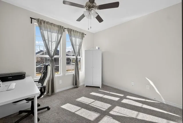 a view of entryway with workspace and stairs