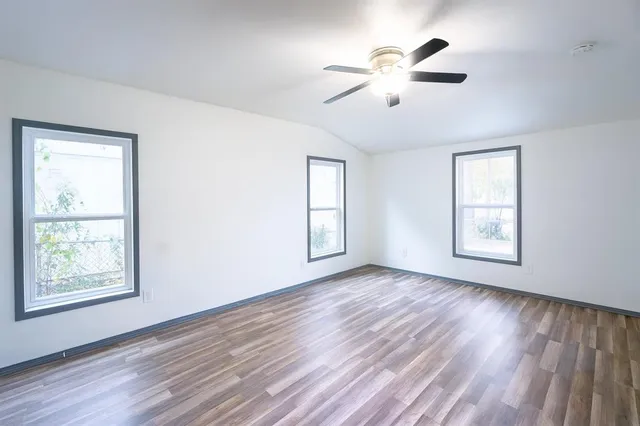 a bathroom with a toilet a sink and shower