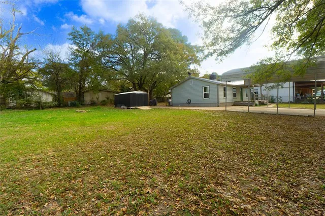 a view of a swimming pool with an outdoor space