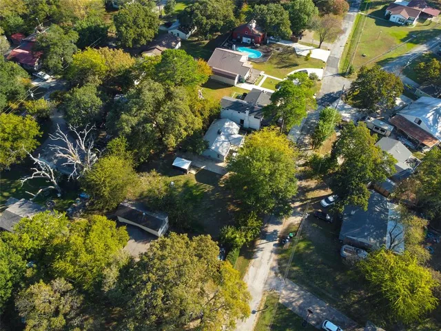 a view of a swimming pool with an outdoor space and seating area