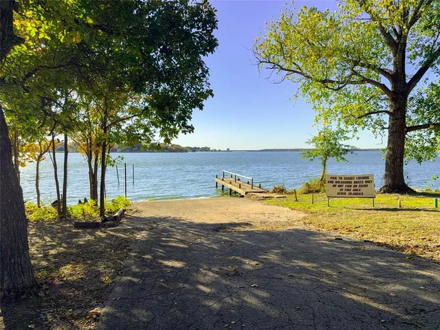 a view of a swimming pool and an outdoor space