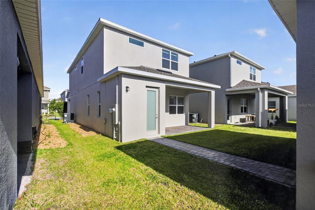 810 MIDDLETON Street DeBary, FL 32713 - Photo 52 of 52 a front view of a house with a yard