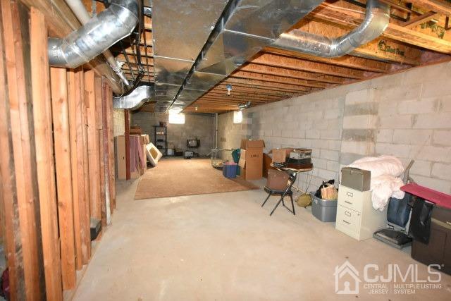 42 Timber Ridge Road North Brunswick, NJ 08902 - Photo 20 of 43 a view of a room with gym equipment