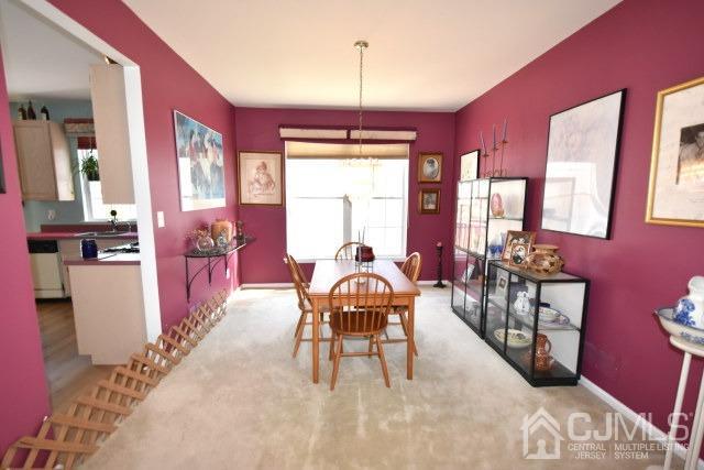 42 Timber Ridge Road North Brunswick, NJ 08902 - Photo 27 of 43 a dining room with furniture and window