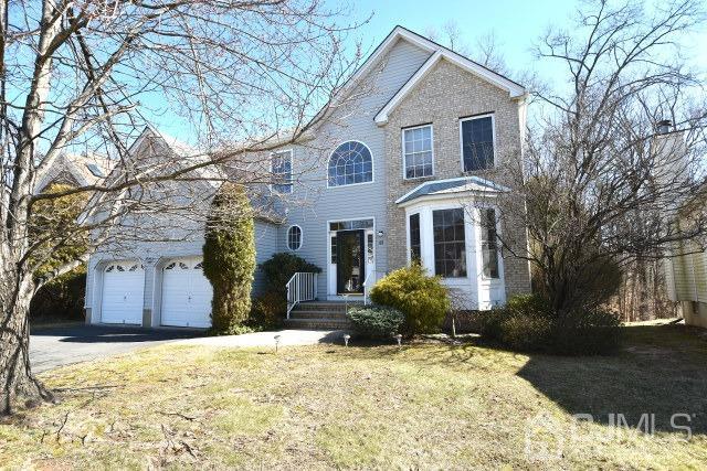42 Timber Ridge Road North Brunswick, NJ 08902 - Photo 32 of 43 a front view of house with yard