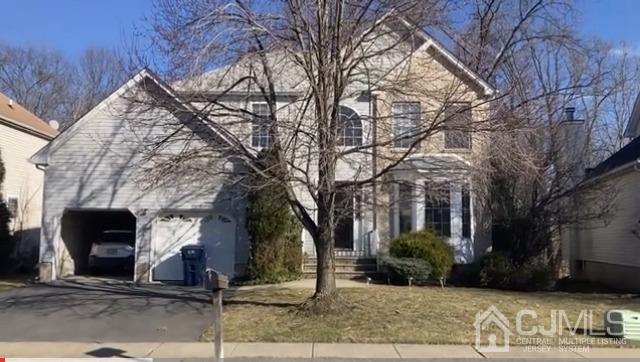42 Timber Ridge Road North Brunswick, NJ 08902 - Photo 35 of 43 a front view of a house with street
