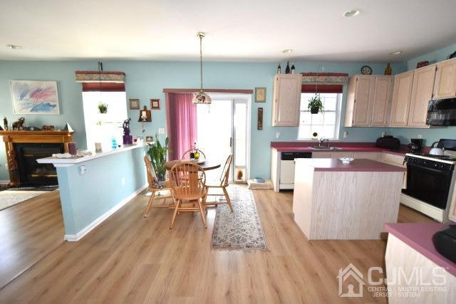 42 Timber Ridge Road North Brunswick, NJ 08902 - Photo 39 of 43 a living room with stainless steel appliances granite countertop furniture wooden floor and a view of kitchen